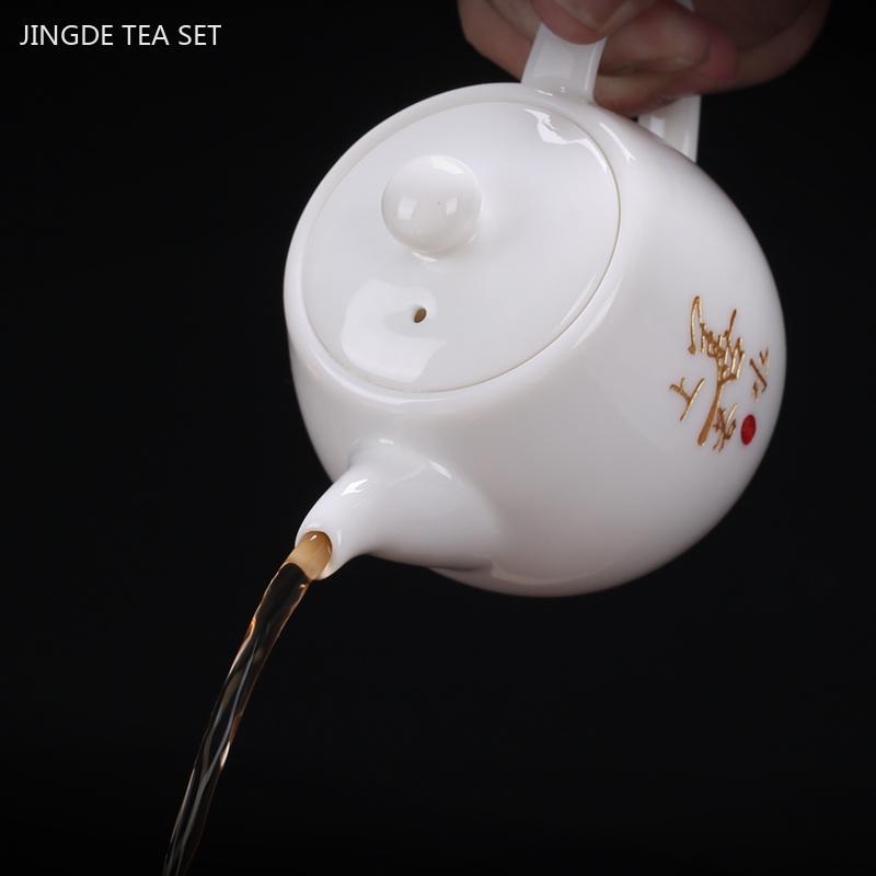 White Porcelain Teapot Custom Ceramic Tea Set Home Beauty Ball Hole Filter Tea Infuser Hand Tracing Gold Kettle Handmade Teaware