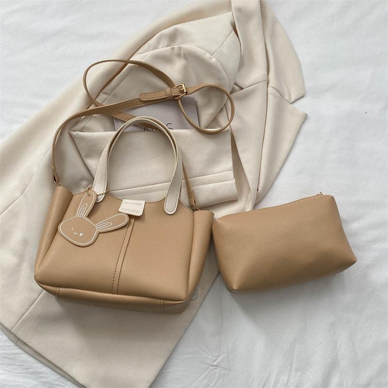 

2025 trendy new fashion niche design popular solid color foreign style casual shoulder crossbody portable mother and child bag хаки