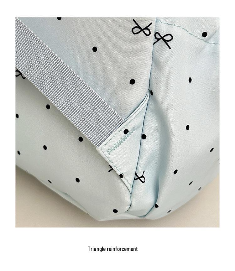 Polka Dot Bow Backpack for Teen Girls: Stylish and Versatile Schoolbag for Middle and High School Students.