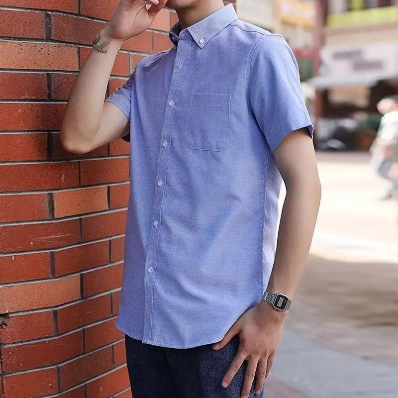 Camicia da uomo a maniche corte casual tinta unita giovane semplice moda trend ins Harajuku camicia da lavoro top