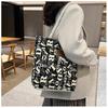 Stylish Large Canvas Tote Bag with Letter Print and Rope Handles for Work and Commute