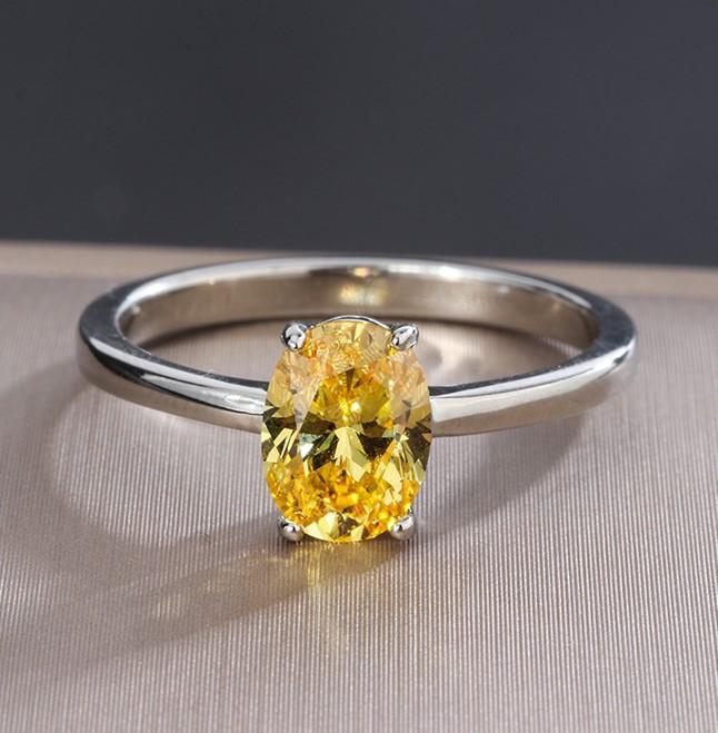 

Ювелирные изделия Цвет Сокровище Популярный Высокоуглеродистый Имитация Желтого Бриллианта 6 * 8 Денье Кольцо 8