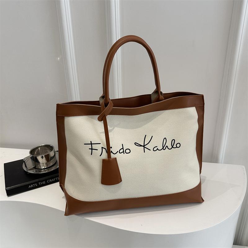 

Large capacity fashion letter handbag women s spring new retro literary personality shoulder tote bag белый