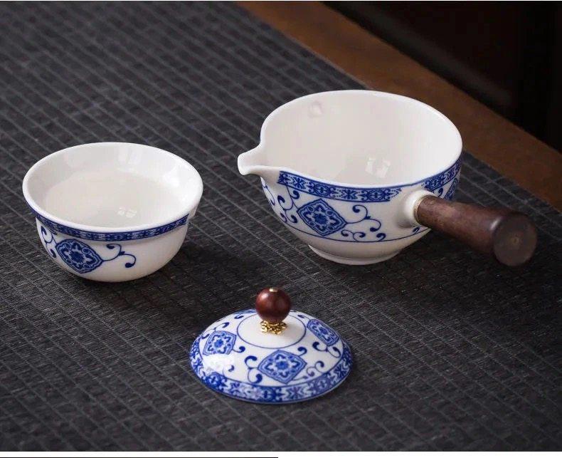 Compact Travel Tea Set with Automatic Rotating Teapot and Side Handle Kung Fu Cups