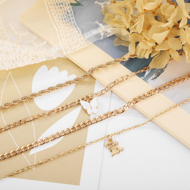Punk Style Hollow Letter Pendant Anklet, Diamond-Encrusted Butterfly Tassel Pendant 4-Piece Anklet Set