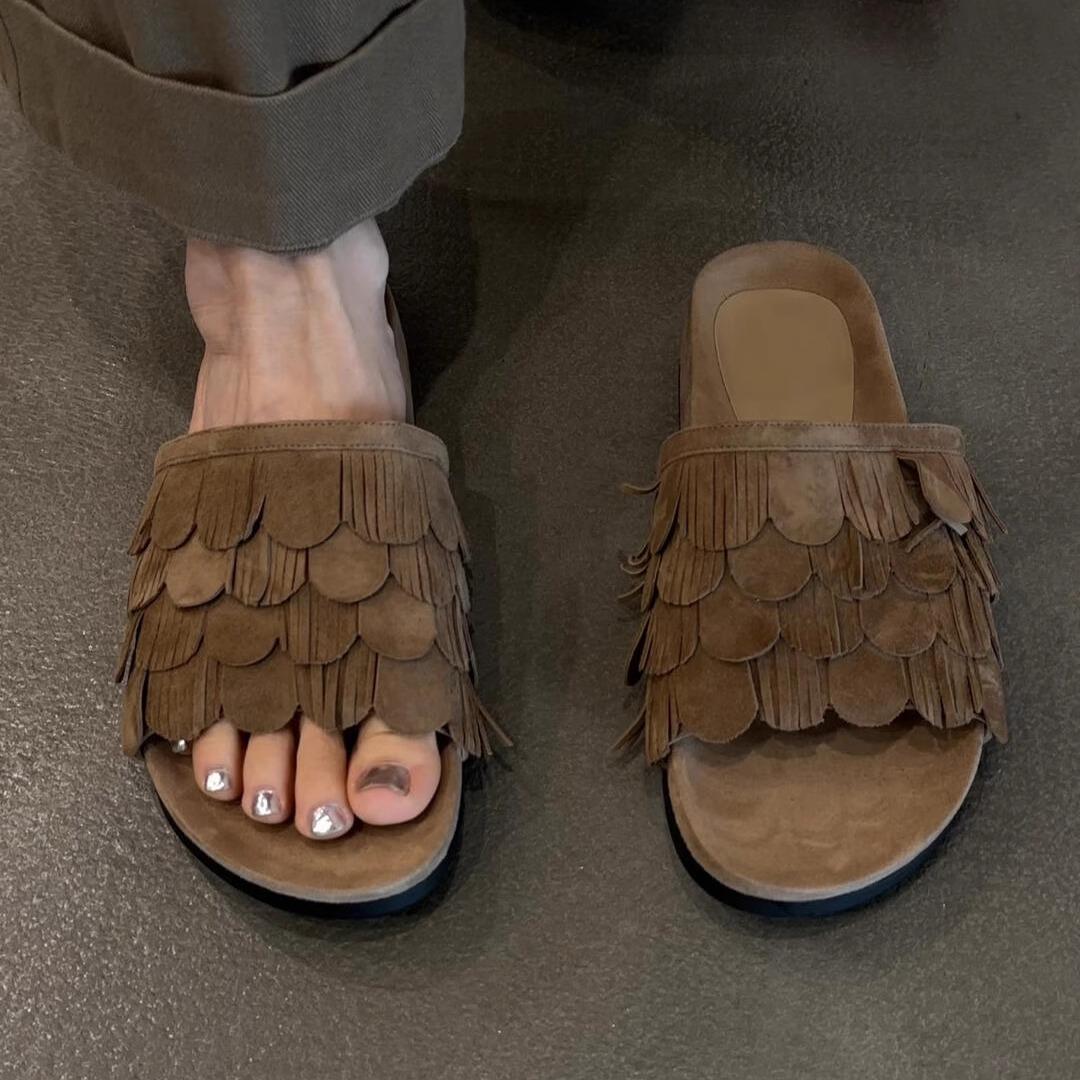 

In the summer of 2025, the new tassel one-word slippers for women s wear are high-end, casual and comfortable, and the flat-bottomed cool slippers are 40 коричневый