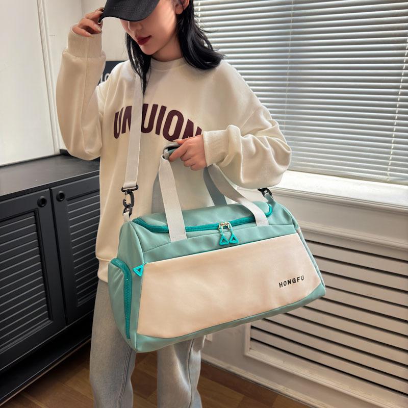 Stylish Color Block Multifunctional Yoga Sports Bag with Wet/Dry Separation, Water-Repellent Fabric, Shoe Compartment, and Handheld Design.