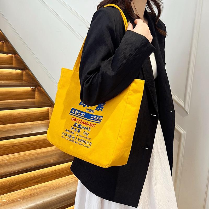 Literature and art large-capacity casual versatile canvas bag women's new shoulder class commuter tote bag tote bag