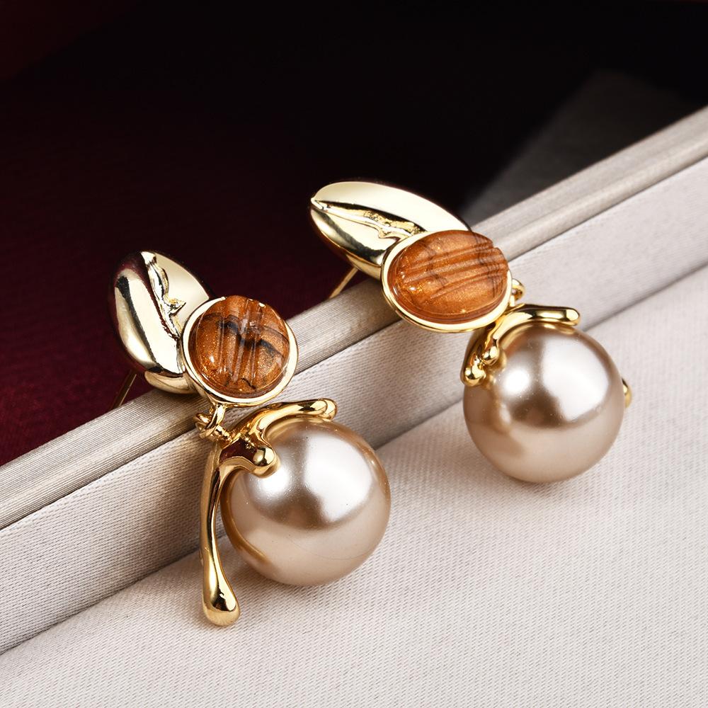 

Модные серьги-подвески для женщин золотой