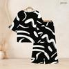 Women Plus Size Round Neck Flared Half Sleeve Top Black White Printed Long Pants Two Piece Set