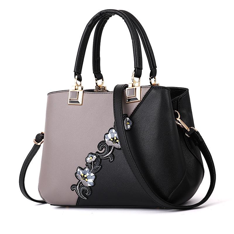 

Simple new contrasting color women s bag handbag foreign style embroidered shoulder messenger bag fashion bag one piece