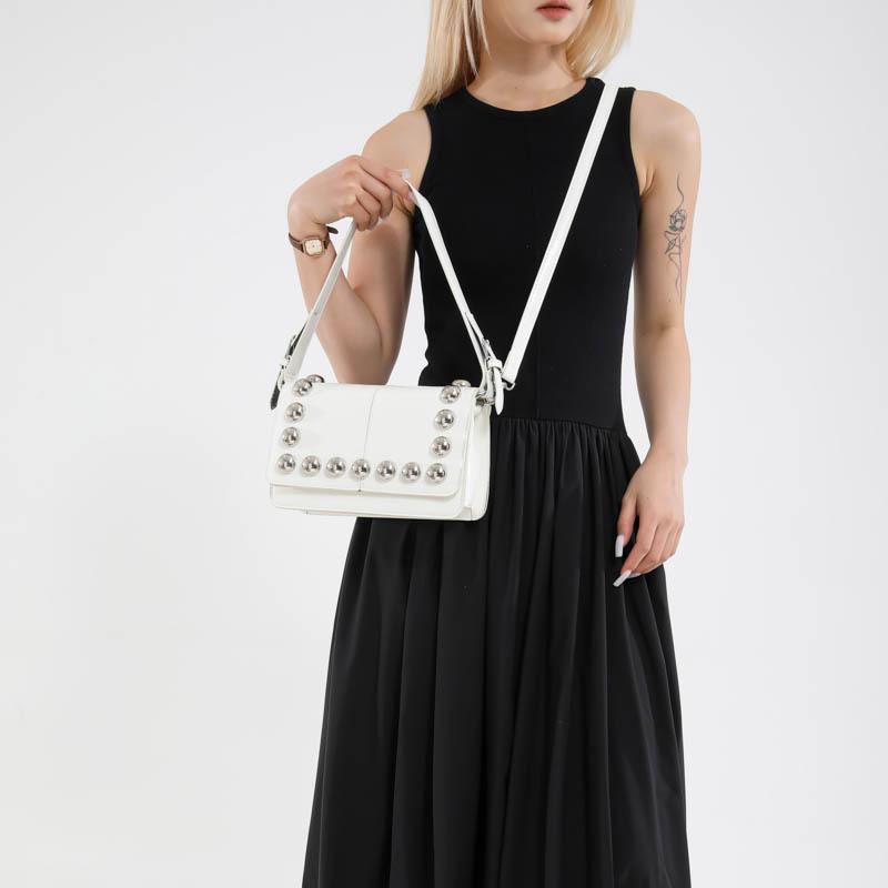 Versatile Locomotive Wind Messenger Bag Women's New Rivet Niche Design Sense Single Shoulder Armpit Small Square Bag