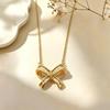 Copper Gold-Plated Bow Knot Pendant Necklace: Elegant & Trendy Accessory for Women.