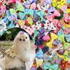 Sött set med husdjursrosetter Små hundar Pälsvårdsaccessoarer Gummiband Valp Katt Huvudbonad Tryckt Rosett Handgjort Hårband för Hund Grossist