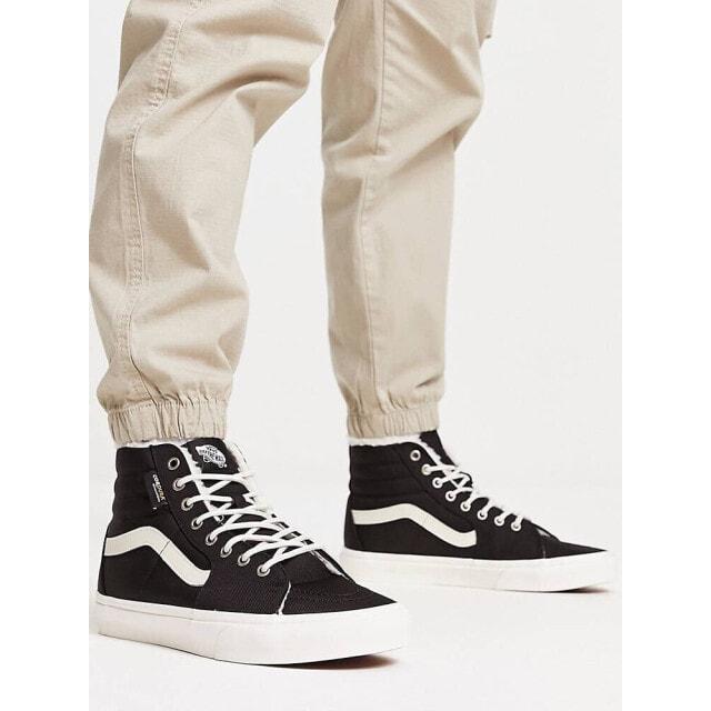 

Черные кроссовки Vans SK8-Hi с подкладкой из шерпа