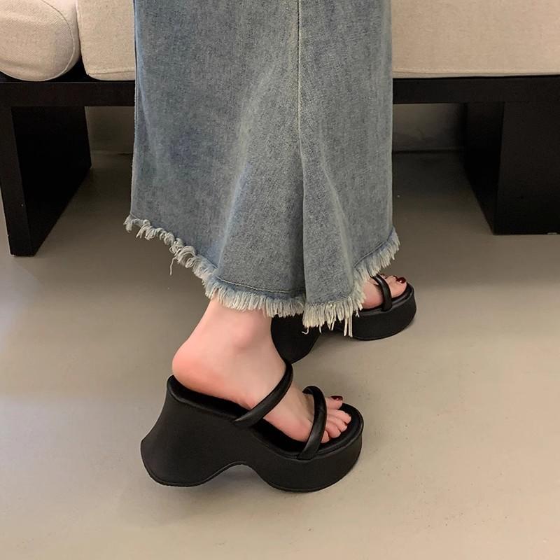 Temperament advanced sense one-word slippers women's summer wear new small thick-bottomed wedge heel high-heeled muffin slippers