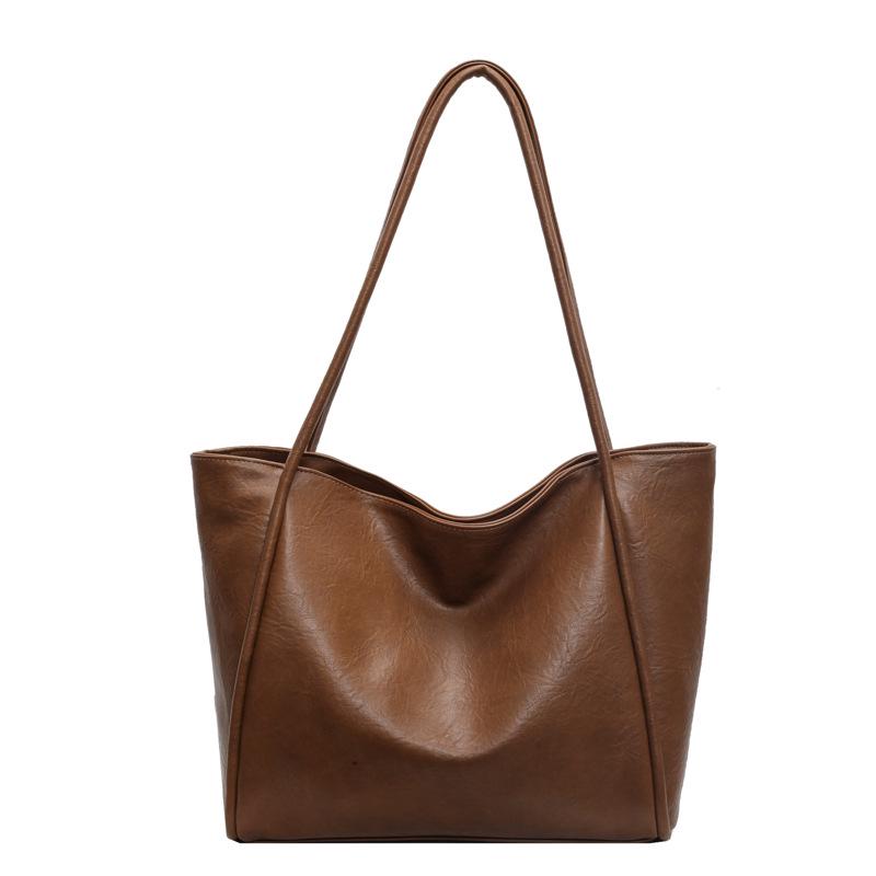 

2026 High-End Fashion Mummy Bag: Versatile Large-Capacity Soft Leather Shoulder Tote for Women світло-коричневого кольору