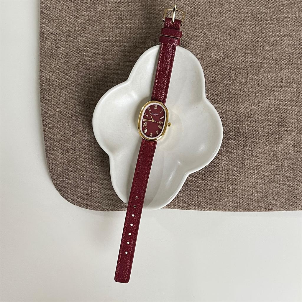 Montre Mode Rétro Style Hong Kong pour Femmes Simple et Polyvalente Échelle Romaine Montre à Quartz Bracelet