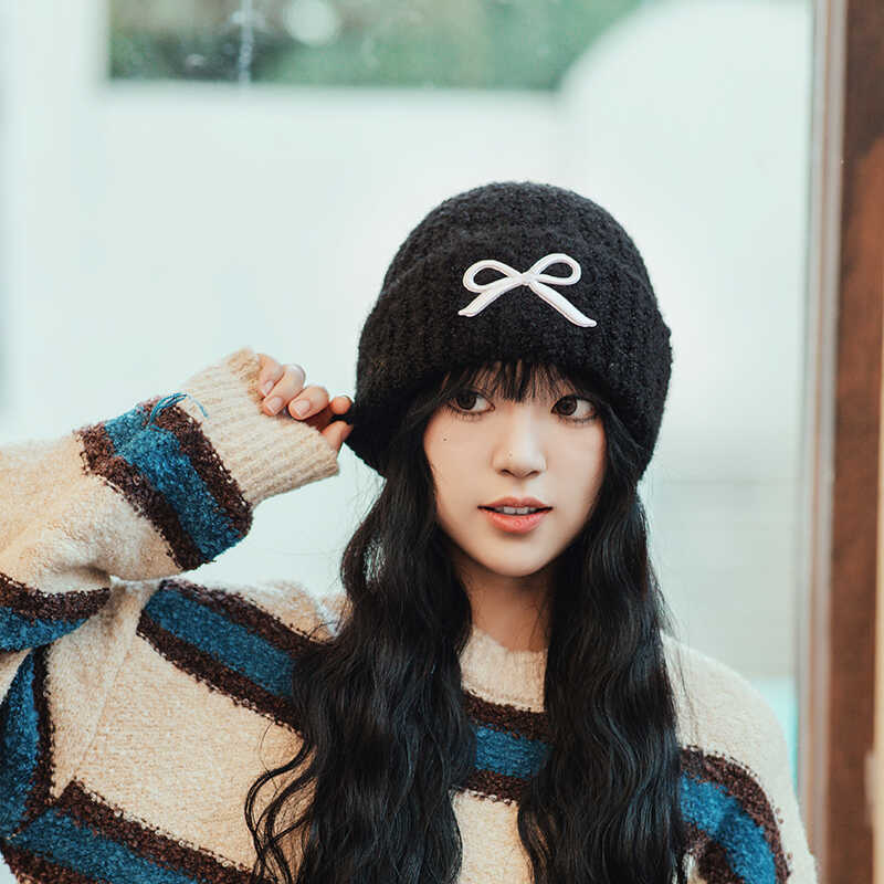 Hat women's autumn and winter wool hat new cute bow versatile cold hat ear protection warm knitted hat tide