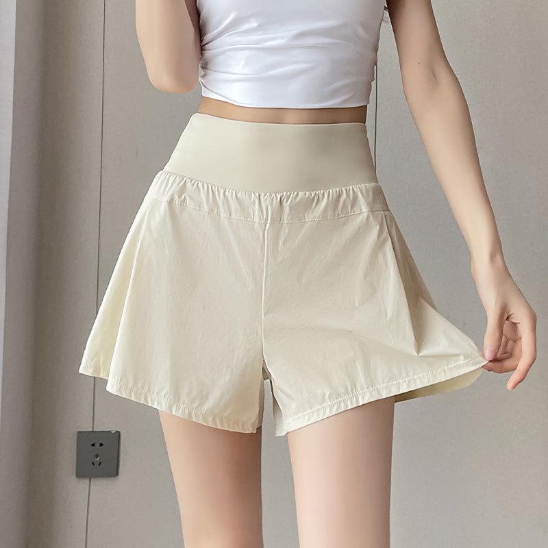 Women's Summer 2025 Quick-Dry Sports Suit: Fashionable Gym & Yoga Outfit with Anti-Exposure Shorts for Morning Runs.