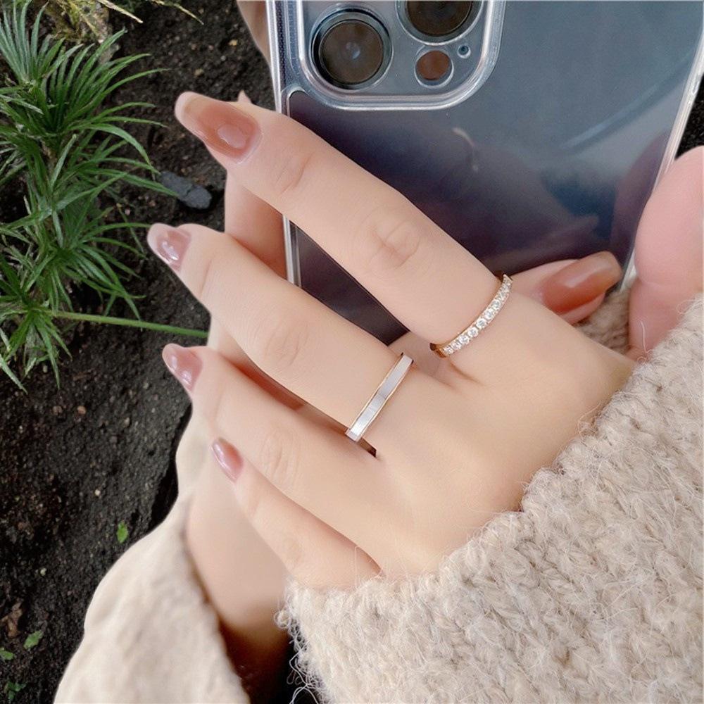 Light luxury titanium steel ring for women, temperament niche ring ins non-fading diamond-encrusted couple ring hand jewelry