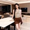 Two-Piece Set: Fitted Halter Neck Backless Top with Irregular Skirt and Wide-Leg Pants.