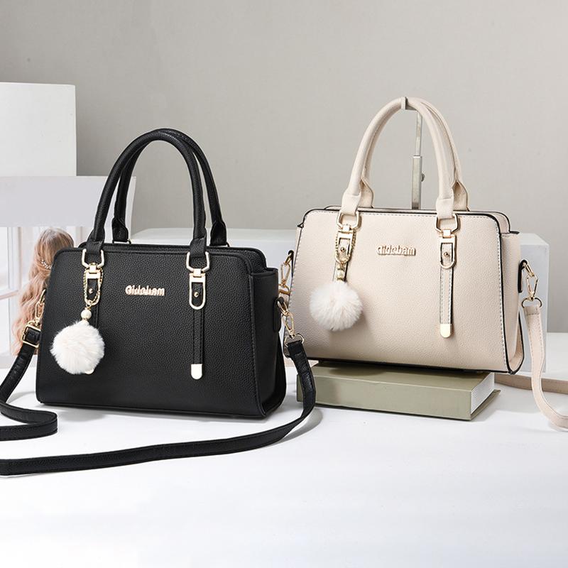 2 Stück Neue Handtasche mit großem Fassungsvermögen PU Wasserdichtes Mehrfach-Reißverschlussfach Schultertasche Temperament Pendler Vielseitig Pompon-Anhänger Umhängetasche
