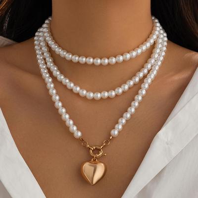 European and American Peach Heart Pendant Necklace: Women's Fashionable Long Pearl & Clavicle Layered Chain.