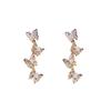 Silver needle zircon butterfly fringed earrings, niche creative design earrings, fashionable light luxury ins style earrings