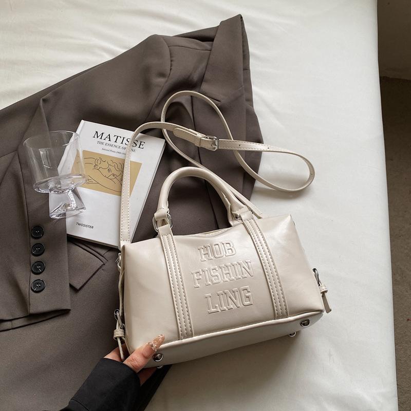 Beliebte Taschen Damen Frühling und Sommer neue vielseitige Umhängetaschen einfache tragbare Kissen-Taschen