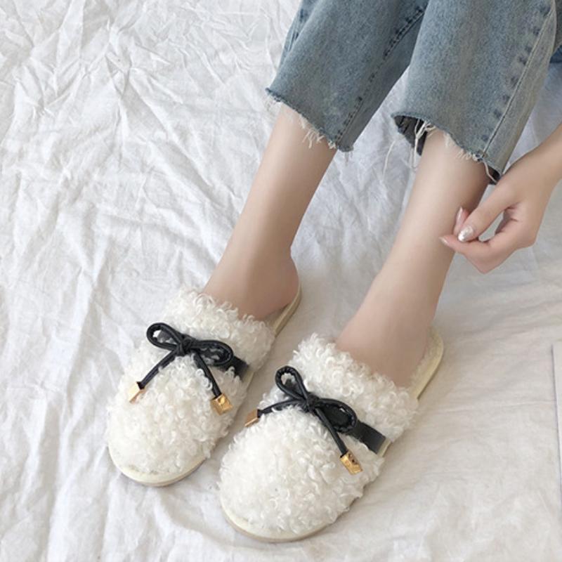 Autumn and winter Baotou hairy slippers, fashionable bow flat bottom anti slip wooden floor cover, foot hair mop