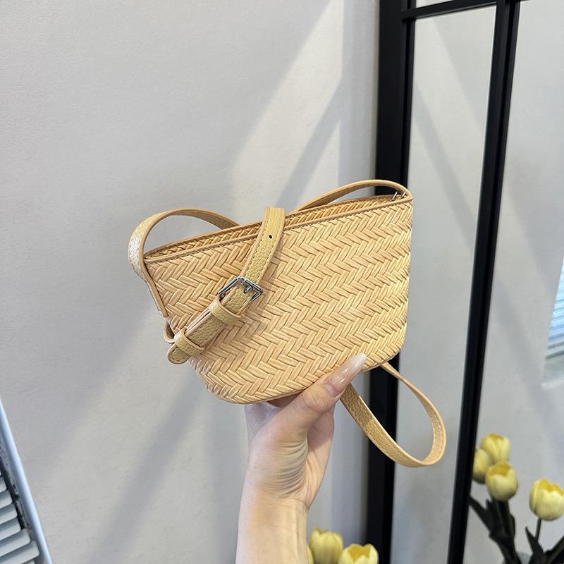 Summer high-end commuting niche mobile phone crossbody small bag women's new woven pattern bucket bag tide