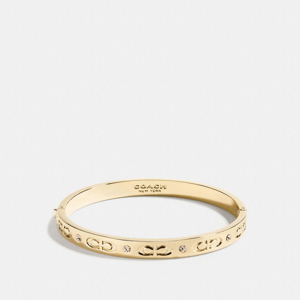 

Браслет Coach Signature Hinged Bangle Cx686 Gld Gold