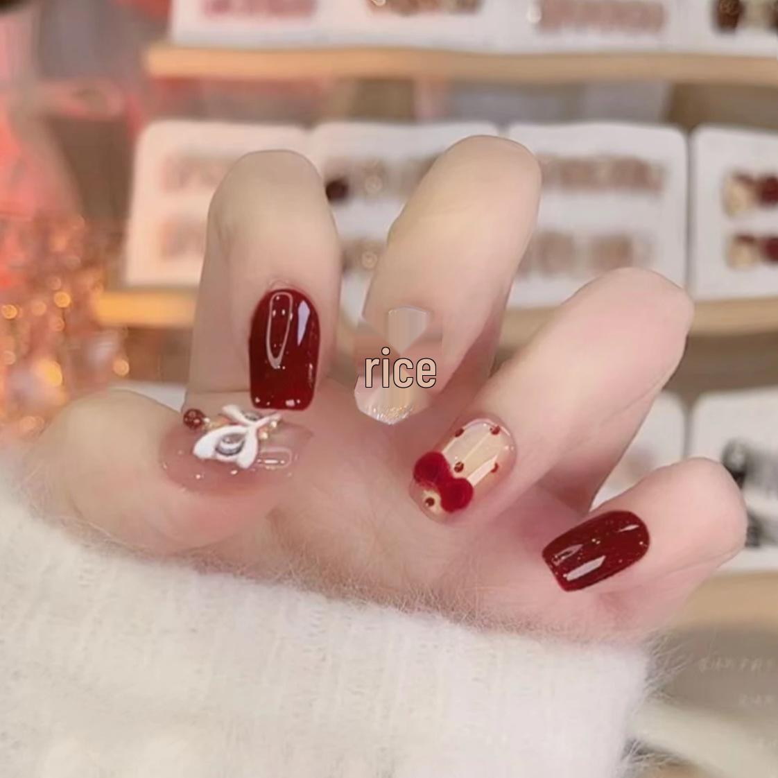 

3D Pearl Lion Dance New Year Nail Art with Velvet Bow and Whitening Stickers
