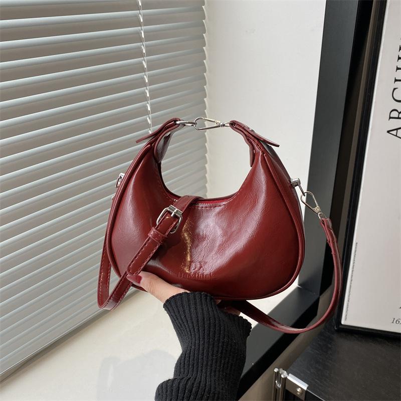 

Korean niche portable crescent moon bag women s 2025 new trendy fashion underarm bag versatile shoulder messenger bag красный