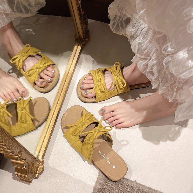 Soft bottom bow slippers women's summer wear new flat bottom versatile seaside beach sandals