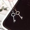 Ethereal Rhinestone Hollow Key Necklace for Women - Designer, Simple, Light Luxury, Ins Style Collarbone Chain.