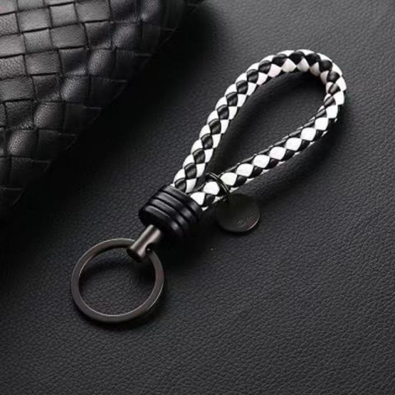 

Запчастини для ключів. Мотузка. Ремінець. Універсальний брелок. Брелок білий/чорний