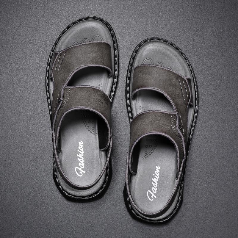 

Сандалии мужские летние новые уличные двойного назначения латексная мягкая подошва нескользящая повседневная интернет знаменитость такие же пляжные тапочки 38