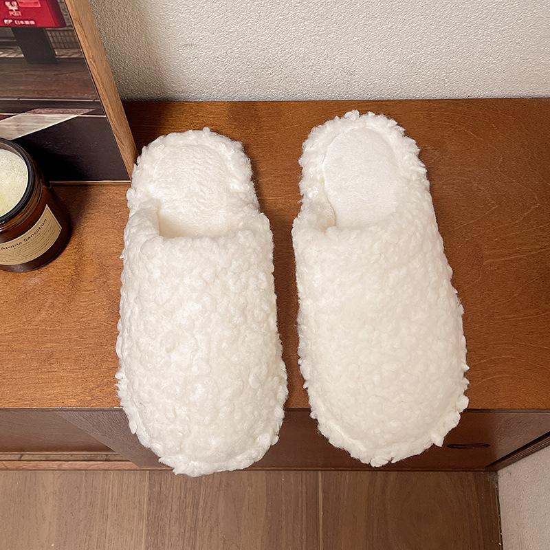 Lamb wool slippers women's wear 2025 new winter Korean version flat-bottomed lazy Muller shoes with velvet bag head half drag