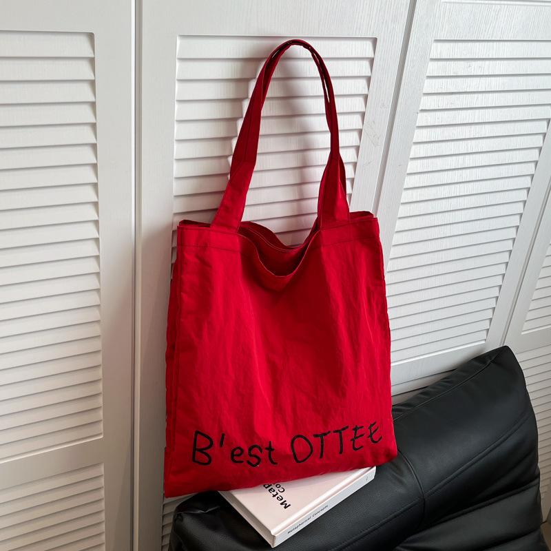 

Niche letter tote oxford cloth large capacity cloth bag shoulder portable college students class women s bag tide червоний