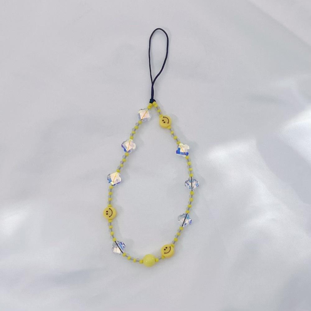 

INS wind smiley face crystal four-leaf clover fashion anti-lost hand carry pendant short mobile phone chain
