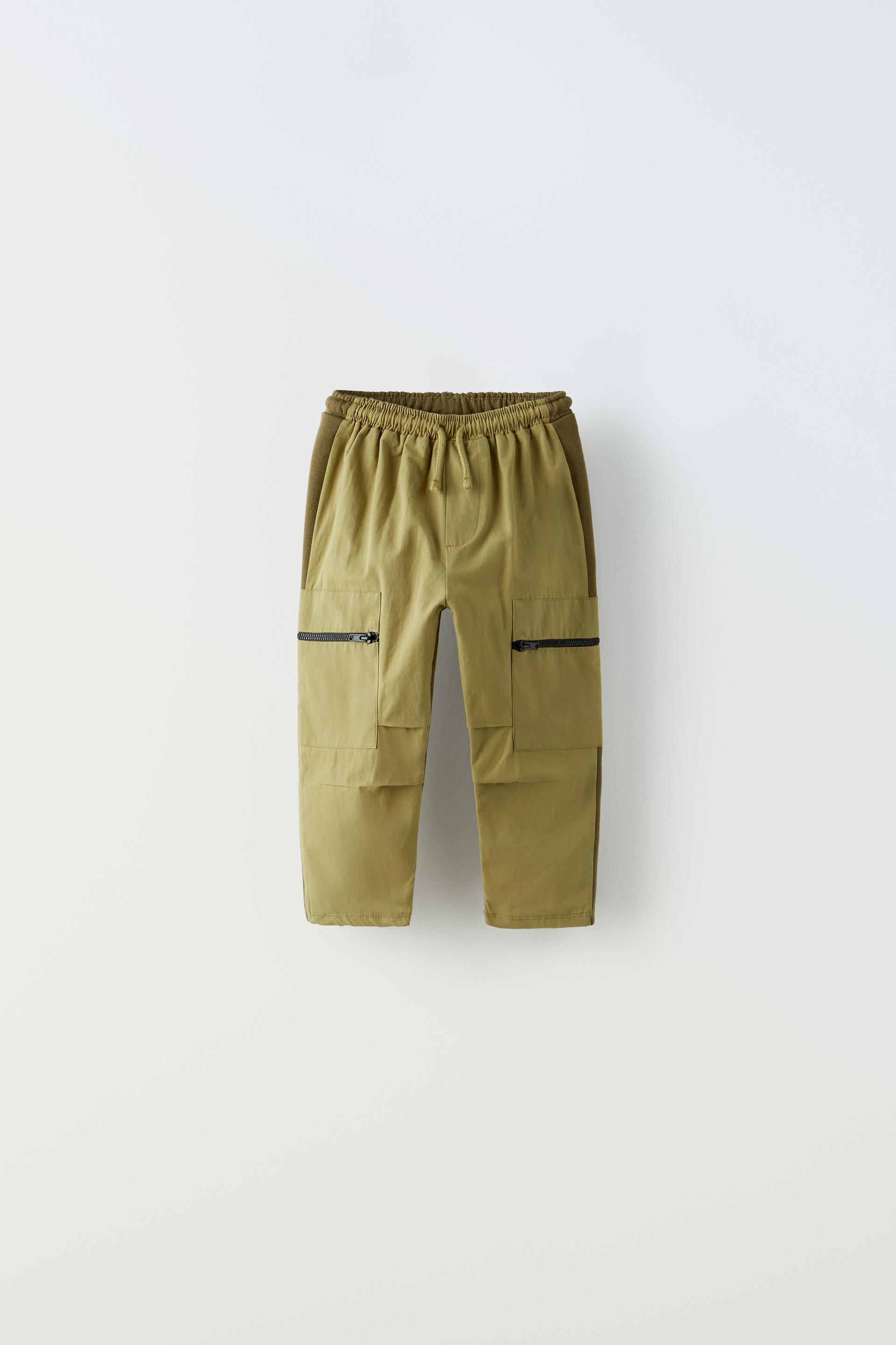 

БРЮКИ С КОНТРАСТНЫМИ МОЛНИЯМИ