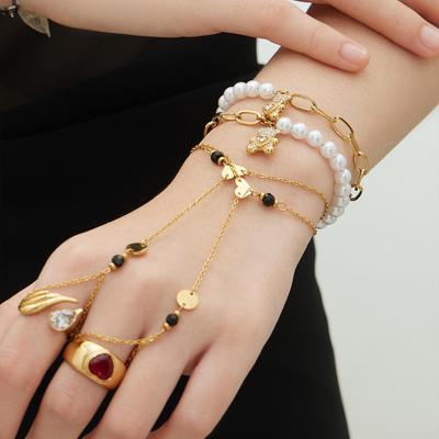 Ensemble bracelet et bague en plaqué or 18 carats avec perles, ours en acier inoxydable et pendentif en zircone cubique.
