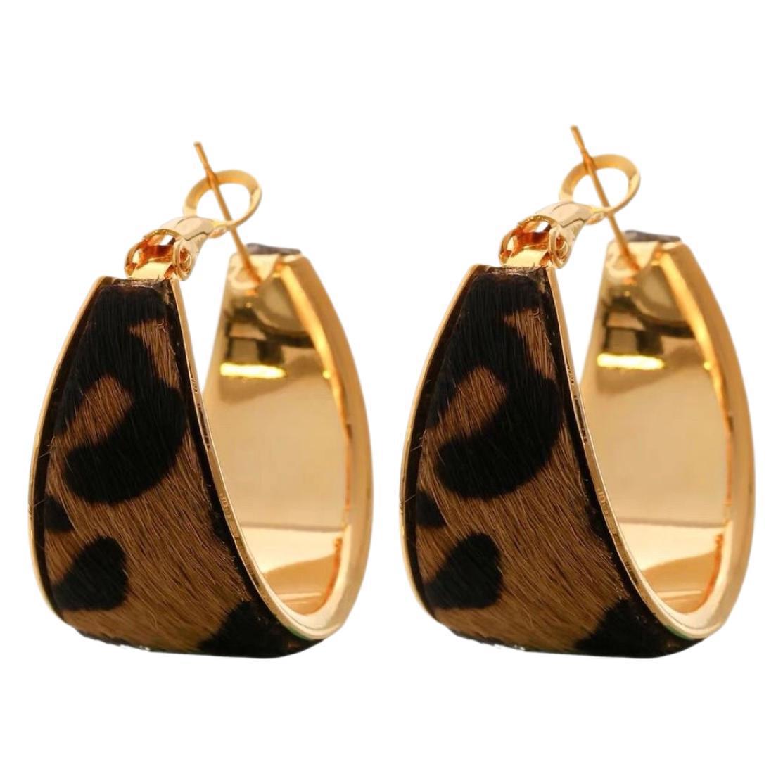 

Геометрические серьги-кольца с леопардовым принтом в стиле Майяра - Модные и универсальные для дерзких девушек