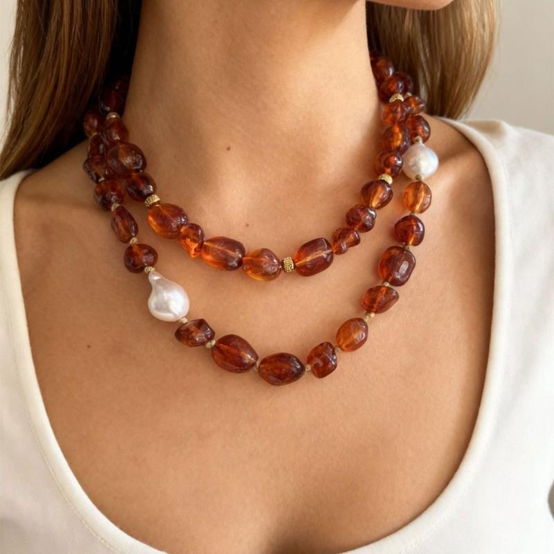 Stylish Red Resin Irregular Bead Necklace With Adjustable Length For Personalized Fit And Artistic Design In Sturdy Alloy Construction.