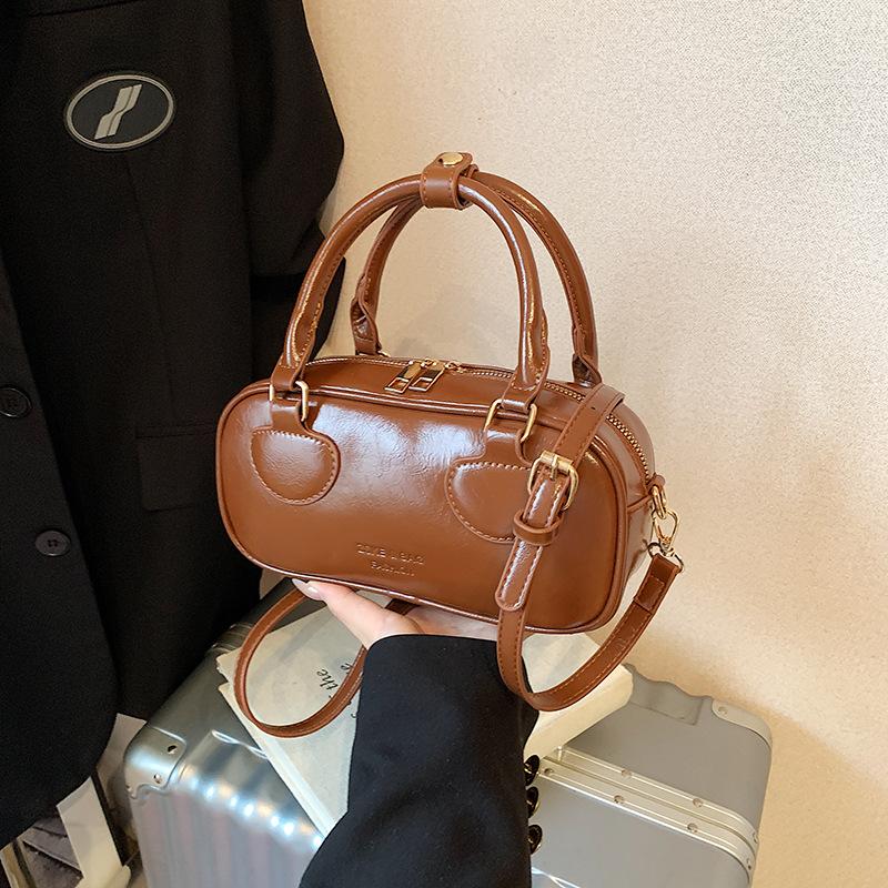 Tragbare Bowlingtasche Damen 2025 neue trendige Mode einfache Kissen-Tasche einzelne Schulter Umhängetasche trendy