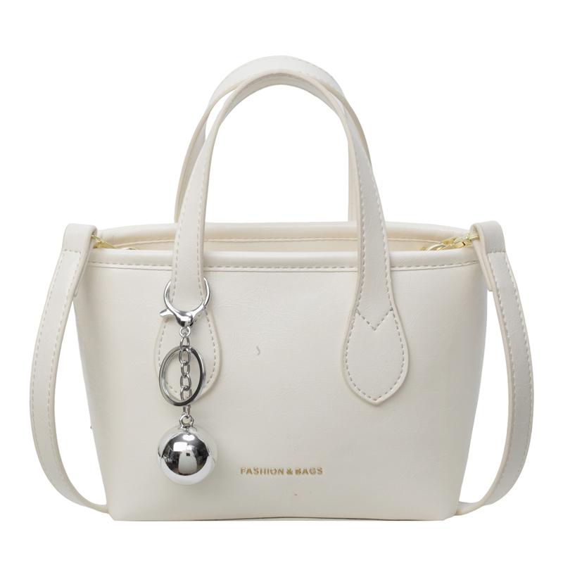 Handheld small bag women's new ins fashion minimalist style shoulder messenger bag oily leather bucket bag