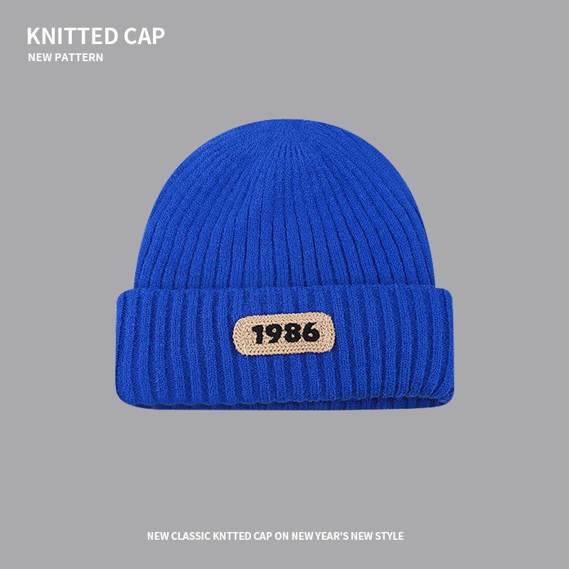 Knitted wool hat children's autumn and winter trendy brand bag head warm cold hat sticker letter big head circumference stacking hat