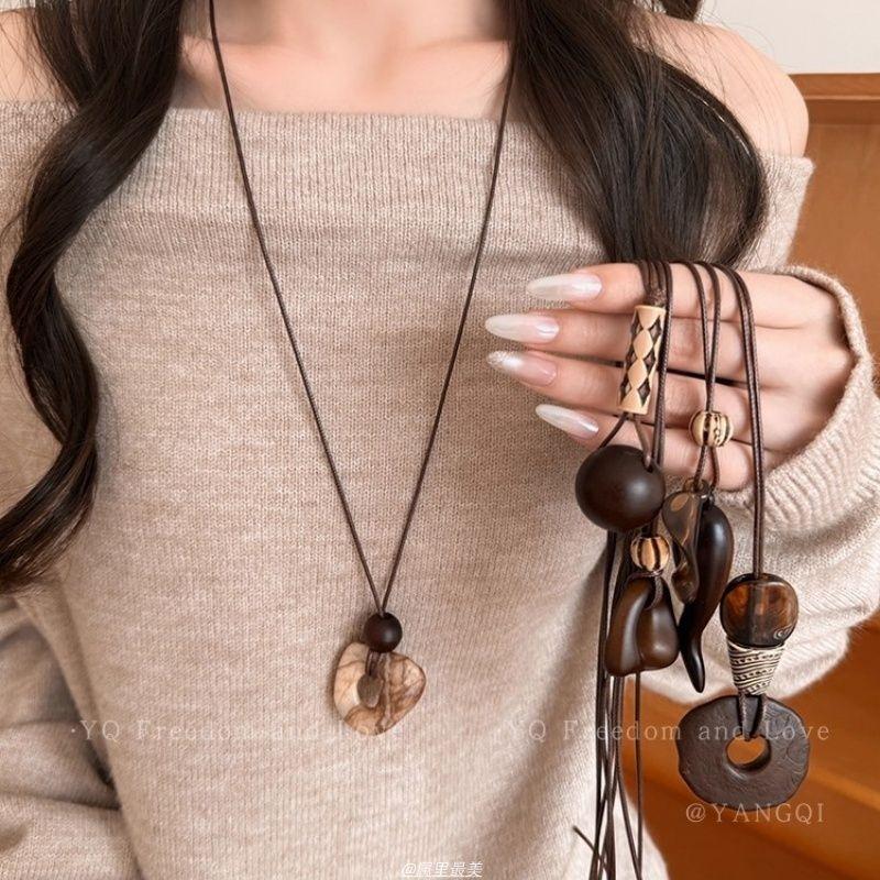 Art Gallery! Vintage Coffee Irregular Pendant Necklace Female Maillard Long Sweater Chain Sense Accessories